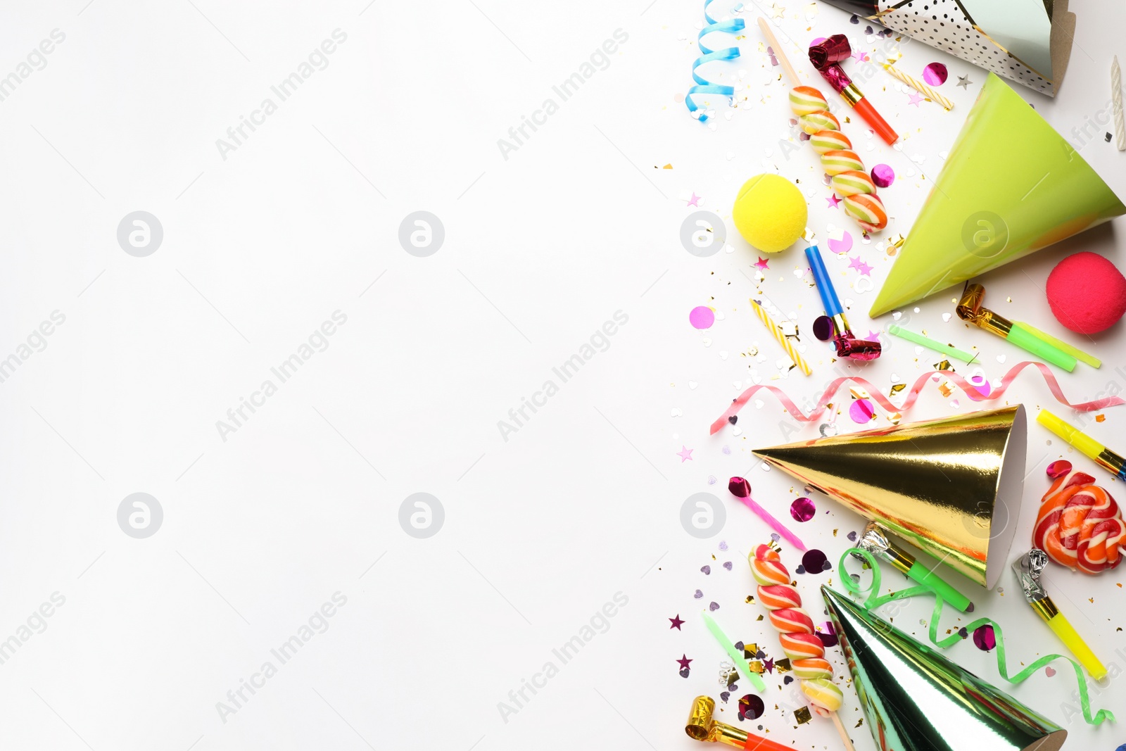 Photo of Beautiful flat lay composition with festive items on white background, space for text. Surprise party concept