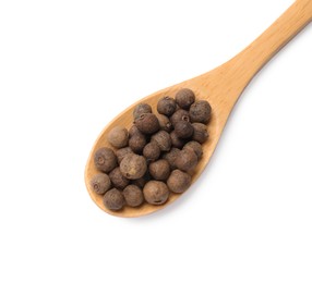 Photo of Dry allspice berries (Jamaica pepper) in spoon isolated on white, top view