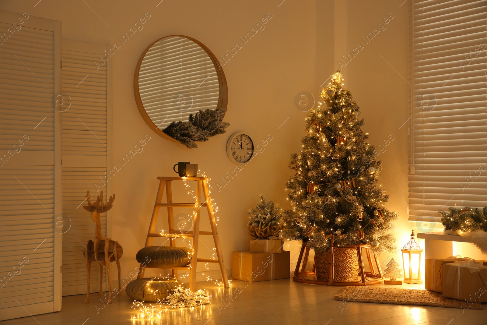 Photo of Beautiful decorated Christmas tree in festive room interior