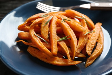 Closeup view of plate with tasty sweet potato fries