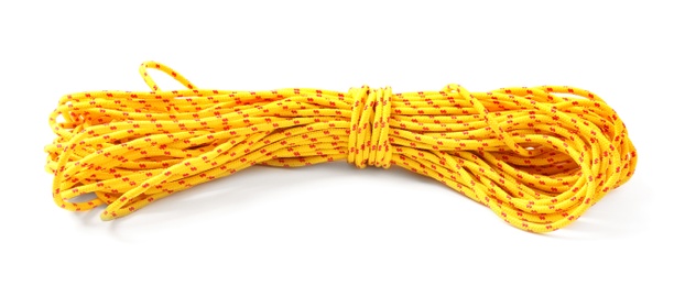 Photo of Coil of rope on white background. Camping equipment