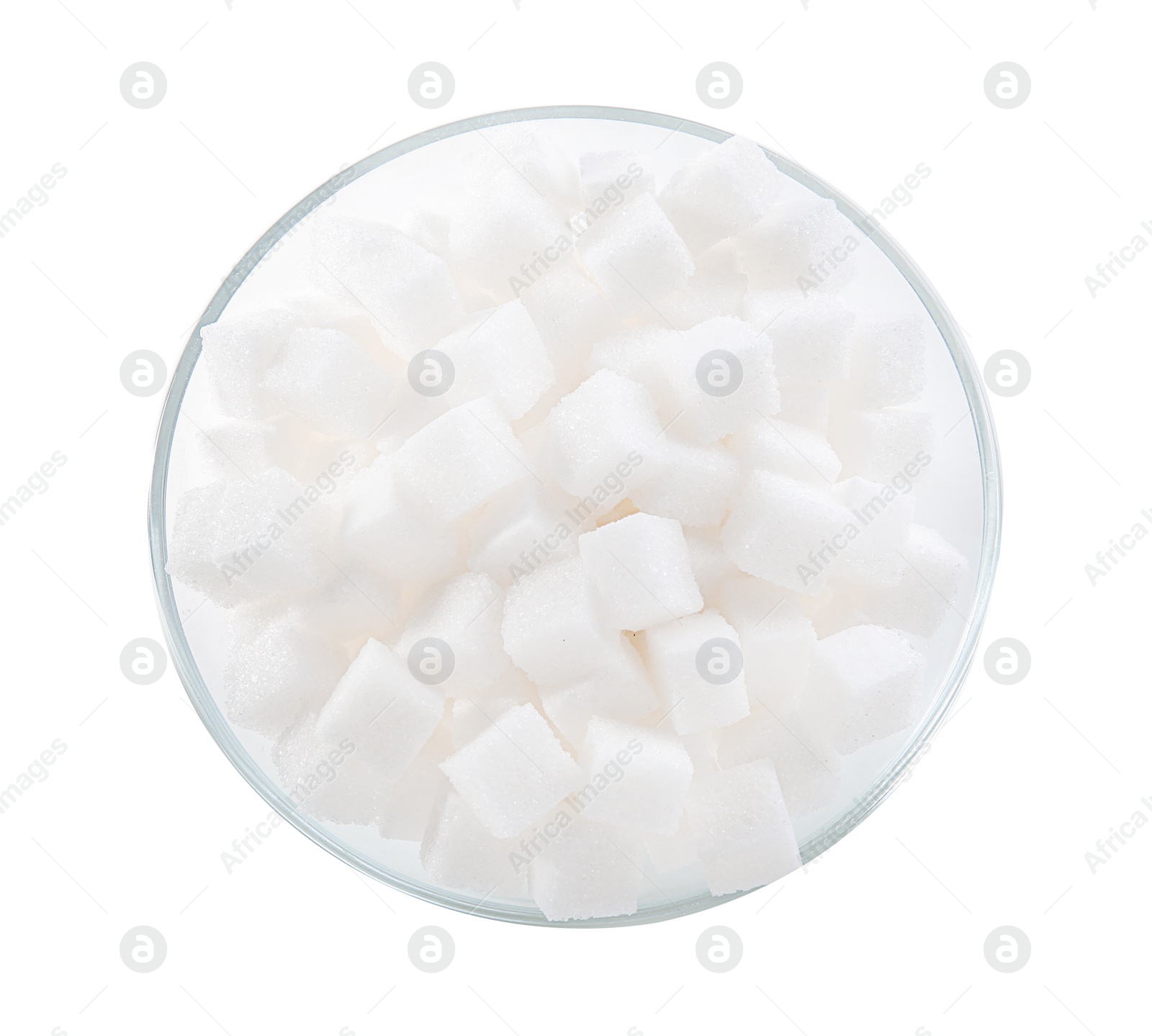 Photo of Refined sugar cubes in bowl on white background, top view