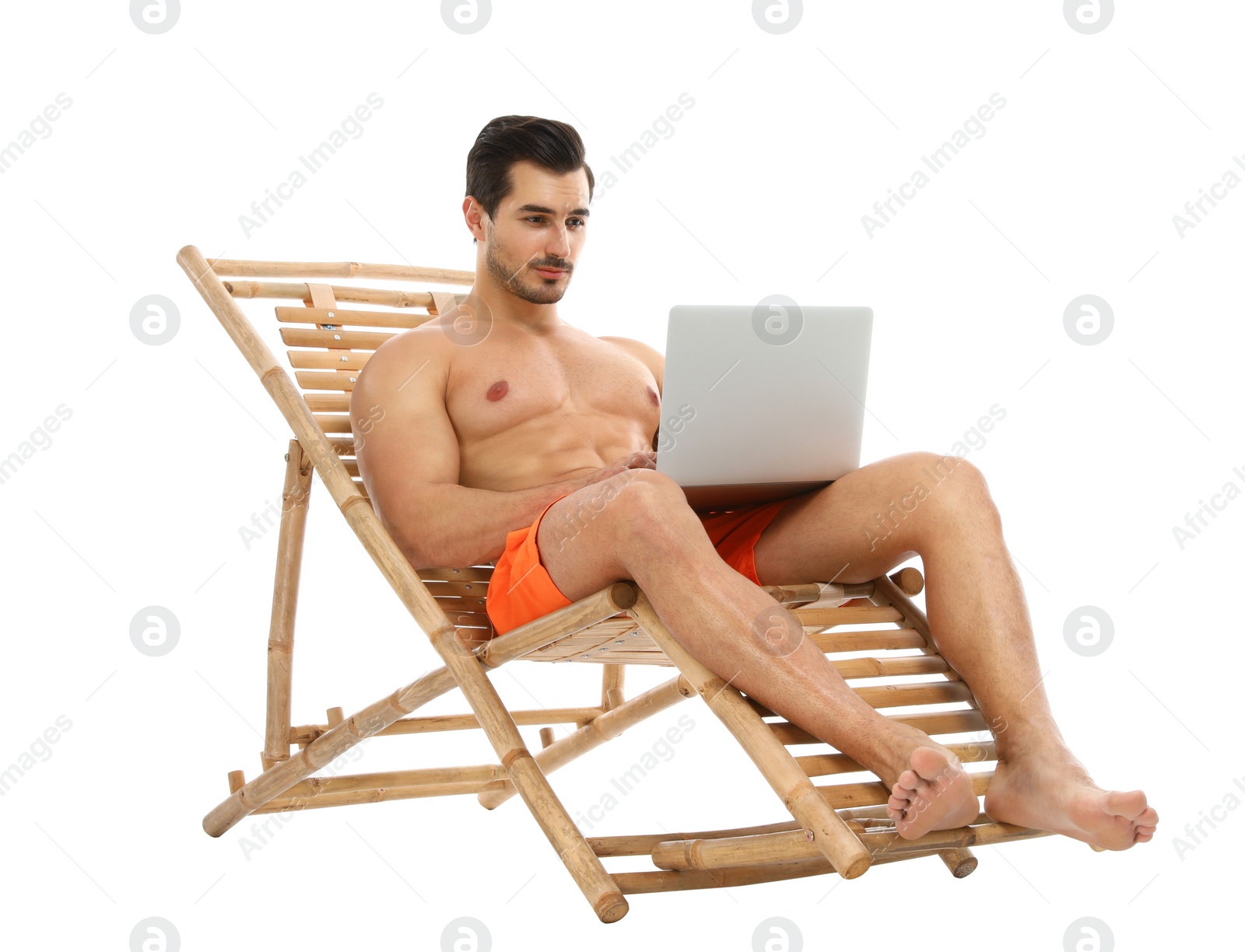 Photo of Young man with laptop on sun lounger against white background. Beach accessories