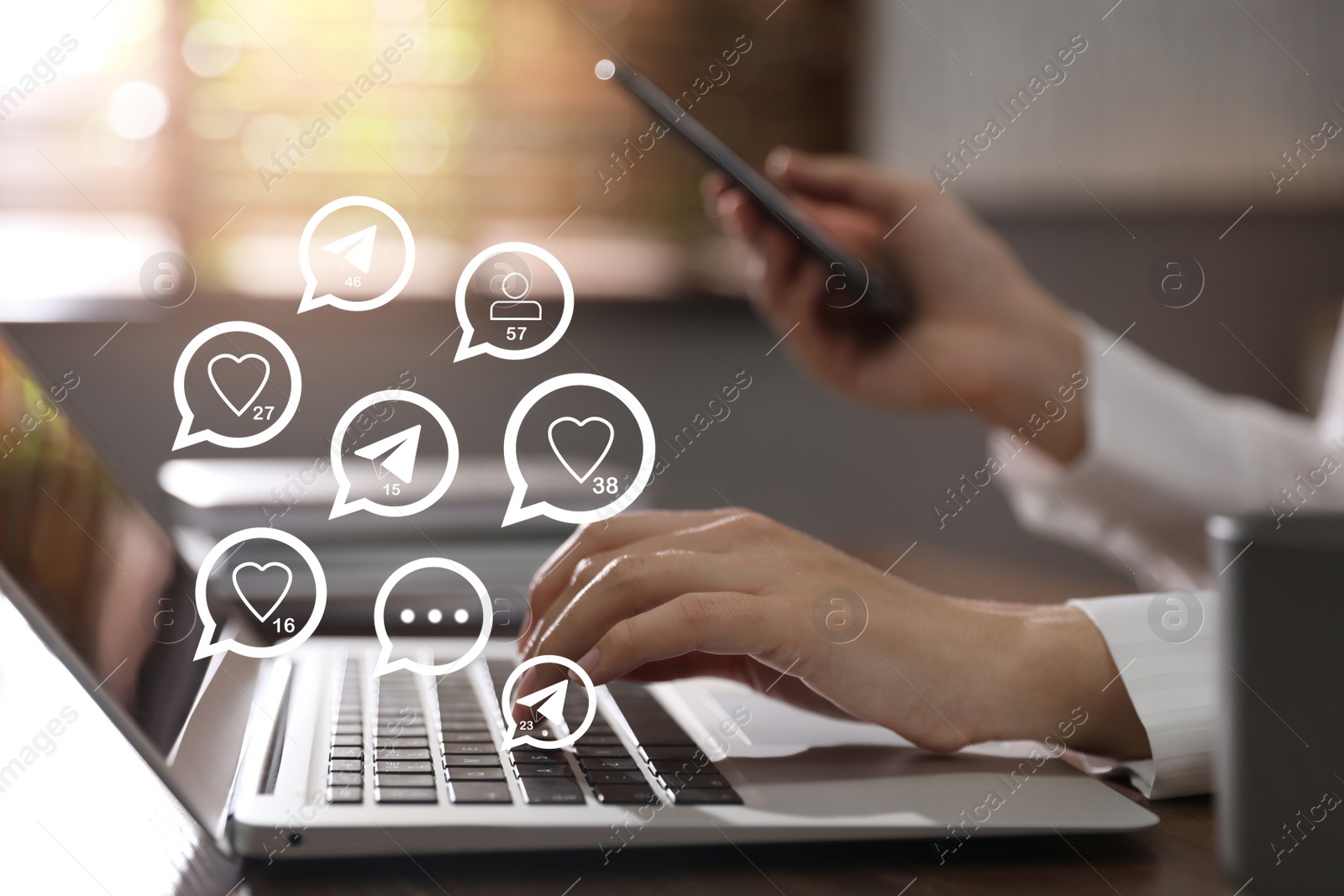 Image of Different virtual icons and young woman using laptop and smartphone at table indoors, closeup. SMM (Social media marketing) concept