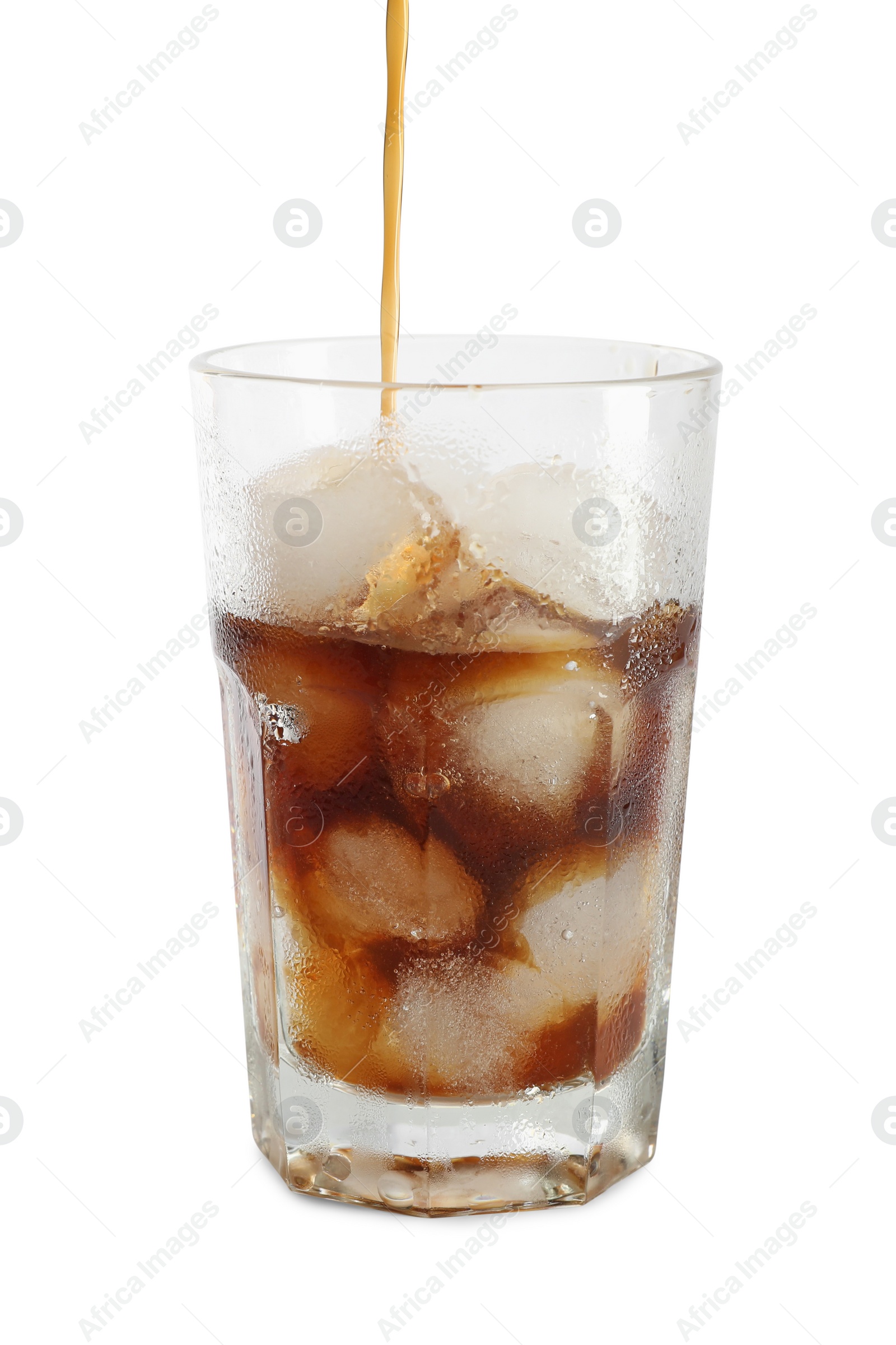 Photo of Pouring coffee into glass of ice cubes on white background