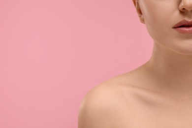 Beauty concept. Woman on pink background, closeup. Space for text