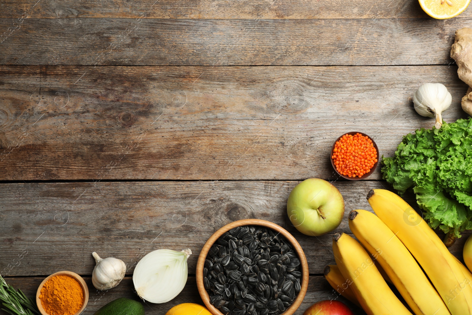 Photo of Flat lay composition with natural products and space for text on wooden background. Home remedies for asthma