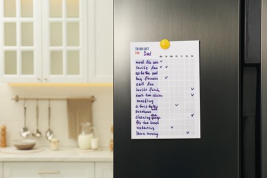 Photo of To do list with magnet on refrigerator indoors. Space for text