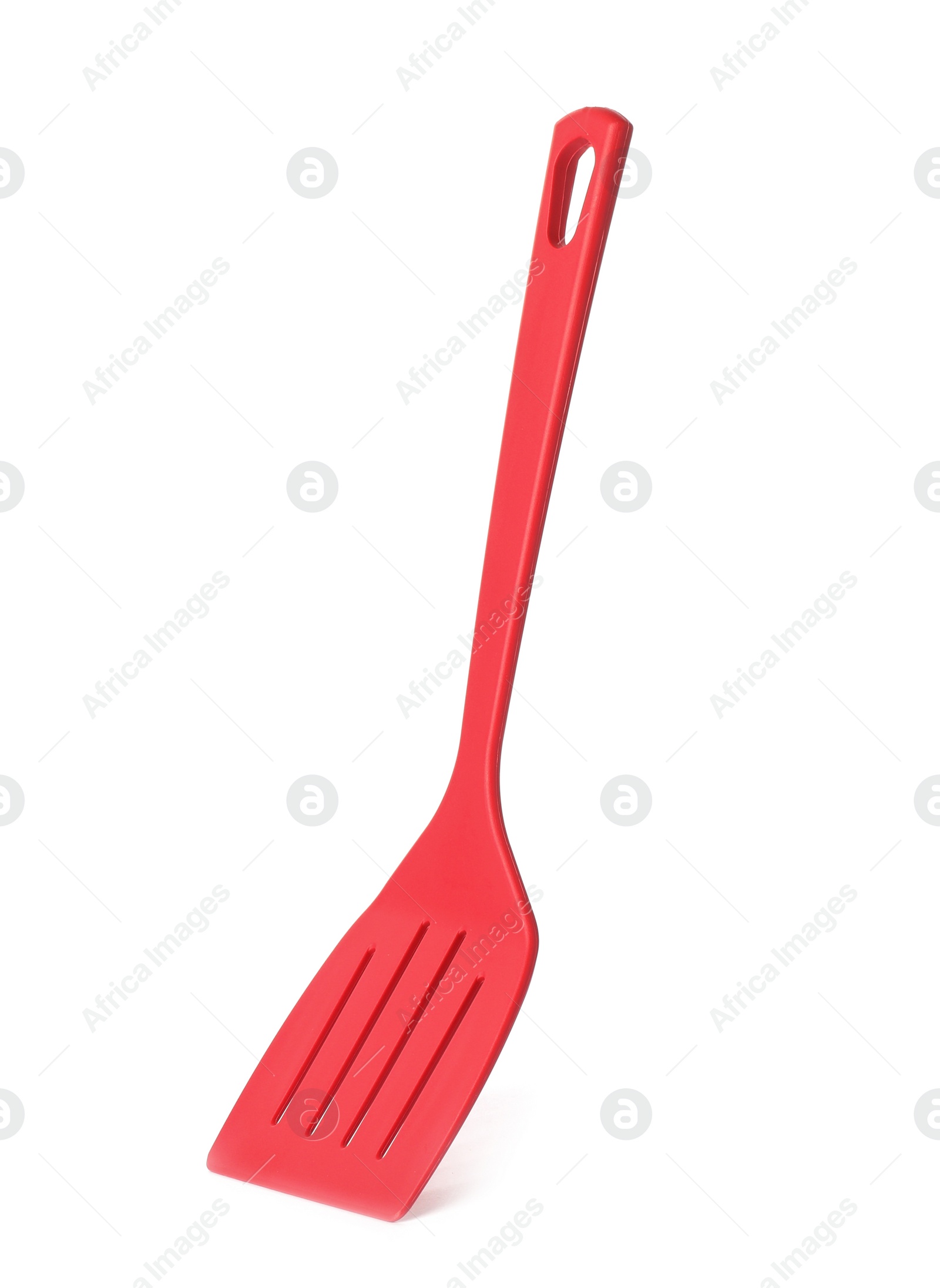 Photo of Slotted turner on white background. Kitchen utensils