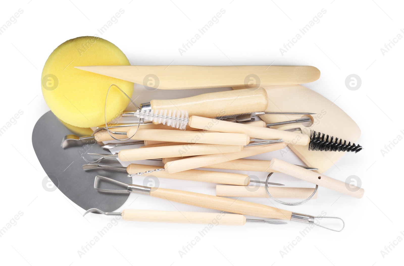 Photo of Set of different clay crafting tools isolated on white, top view