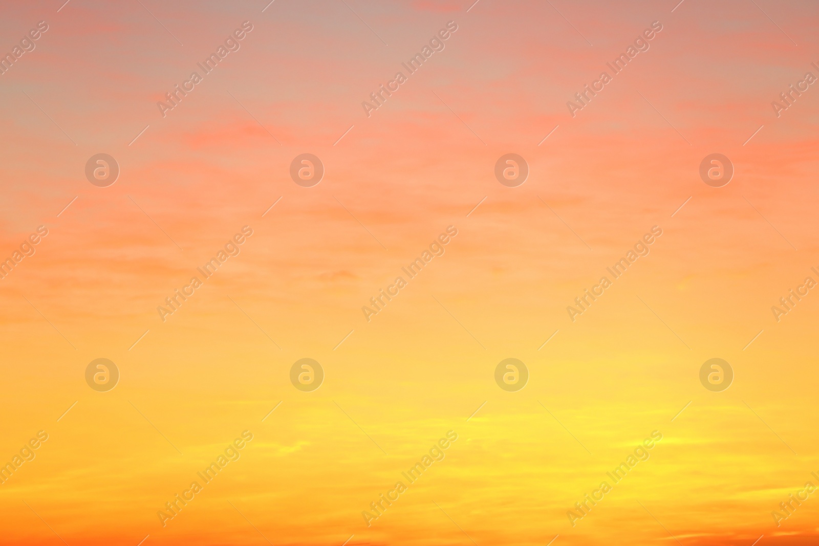 Photo of Picturesque view of beautiful sky lit by setting sun