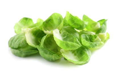 Photo of Leaves of fresh Brussels sprouts isolated on white