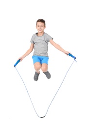 Photo of Full length portrait of boy jumping rope on white background