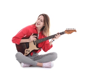 Young woman playing electric guitar on white background