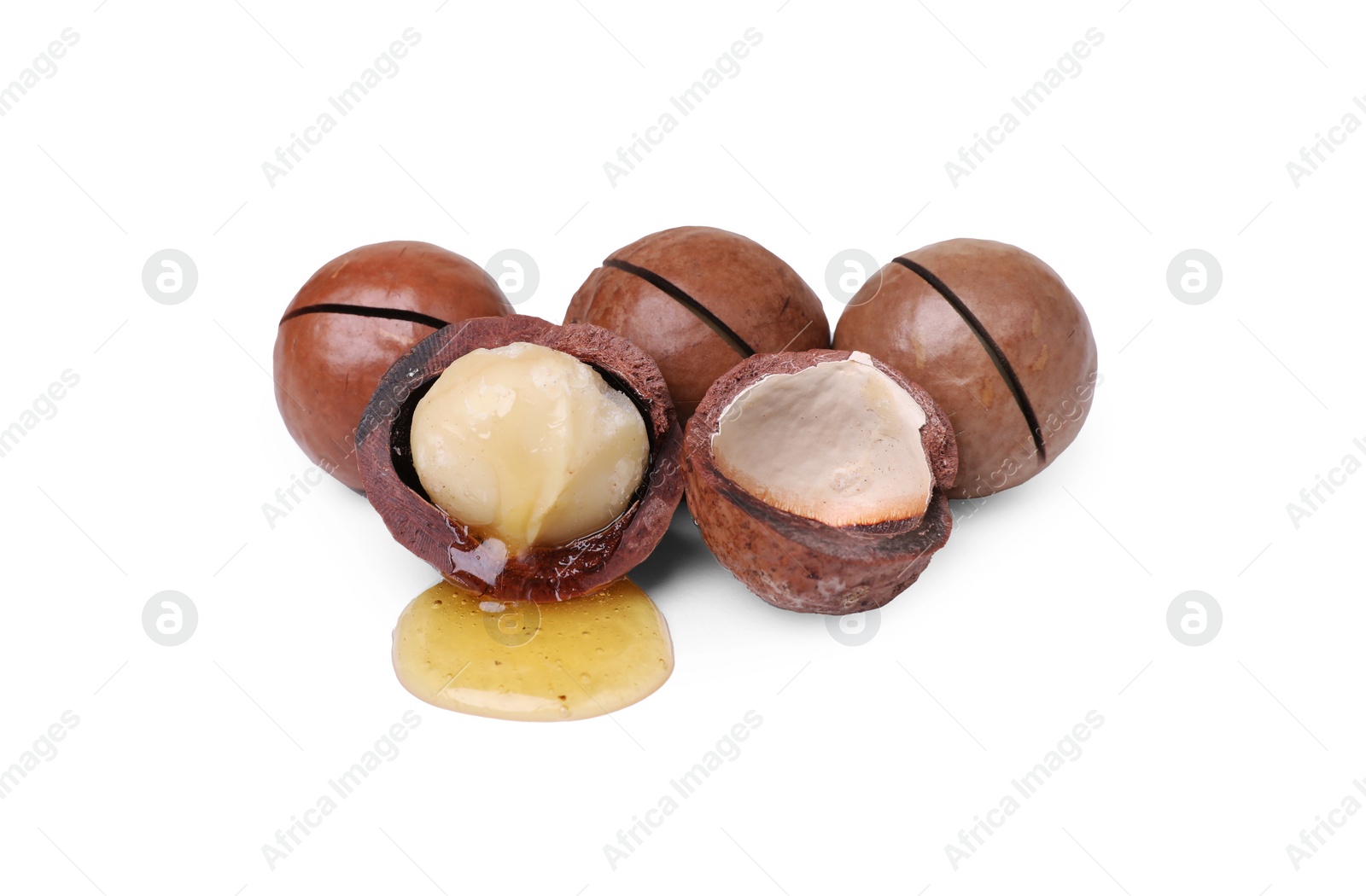 Photo of Delicious organic Macadamia nuts isolated on white