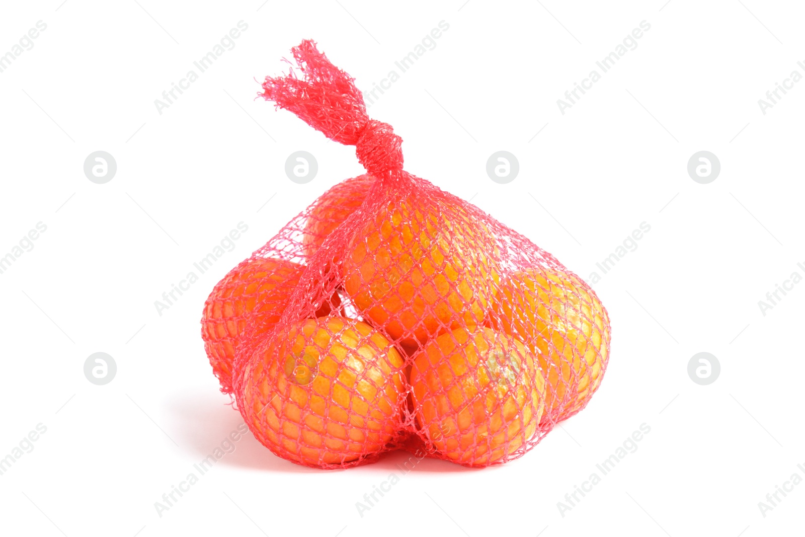 Photo of Mesh bag with tangerines on white background