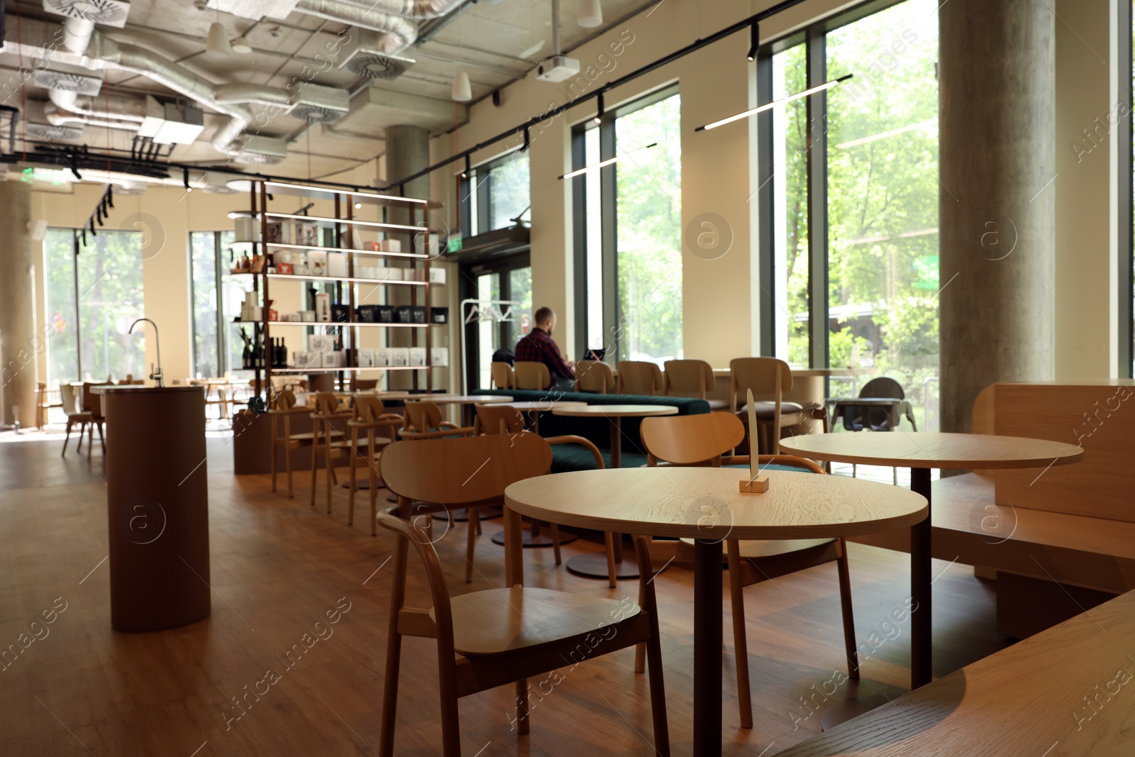 Photo of Modern cafe with stylish furniture. Interior design