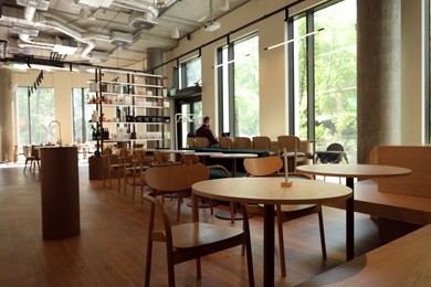 Photo of Modern cafe with stylish furniture. Interior design