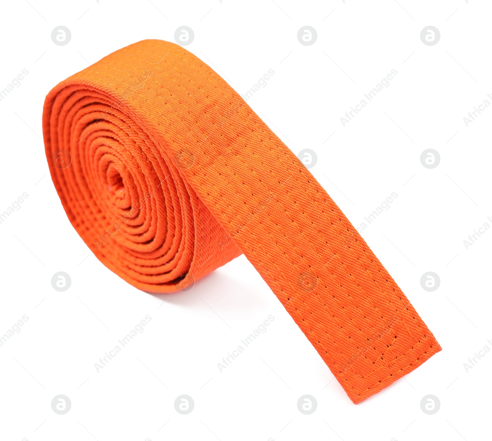 Photo of Orange karate belt isolated on white. Martial arts uniform