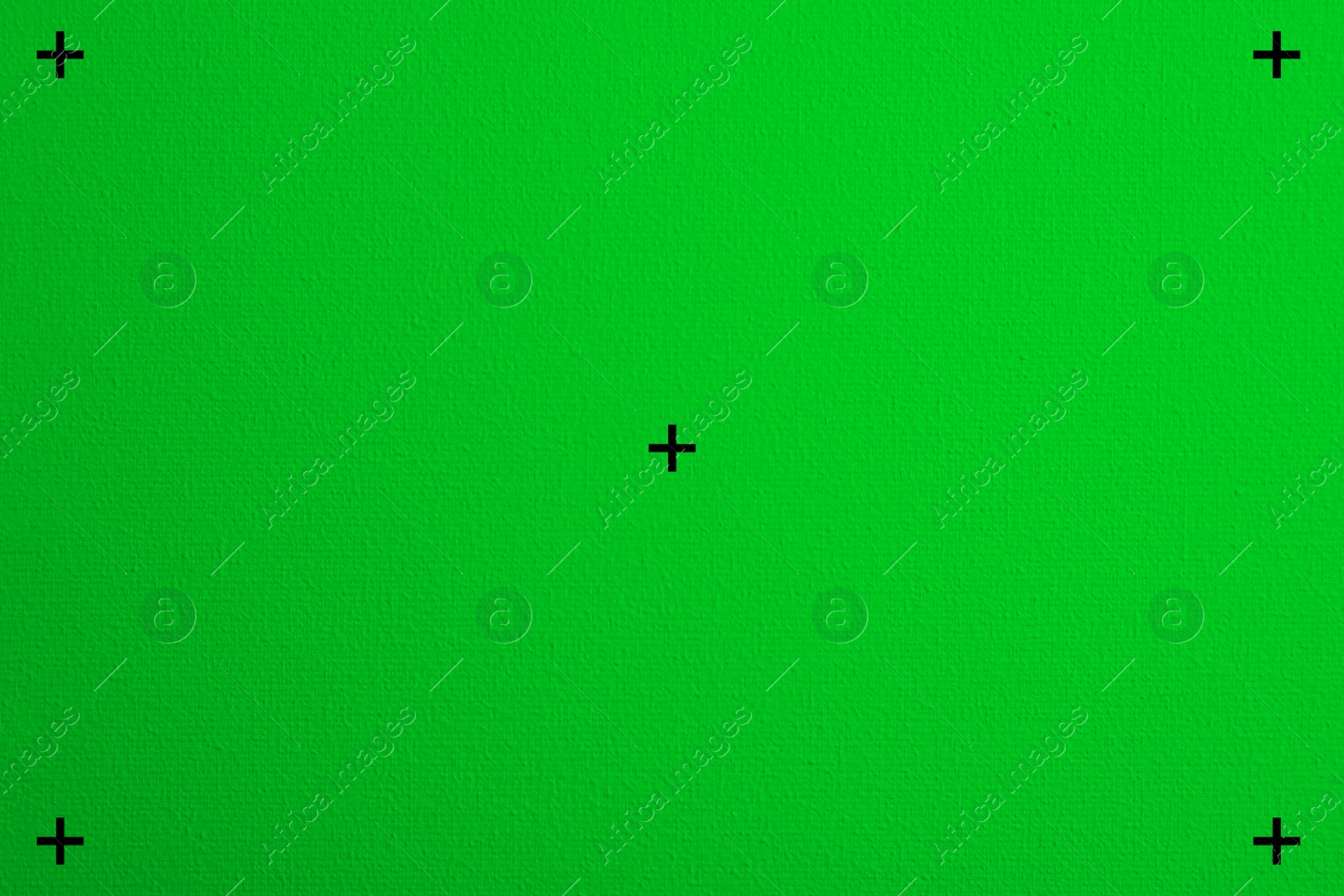 Image of Textured bright green background. Chroma key compositing