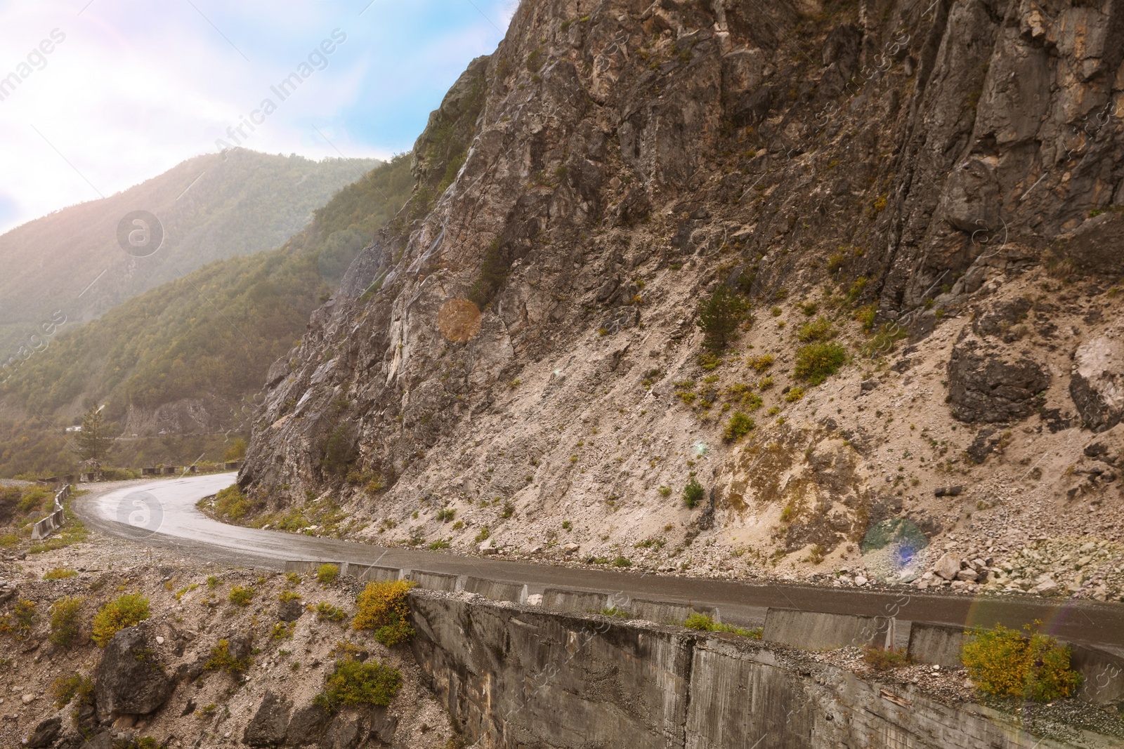 Photo of Picturesque view of empty road near mountains