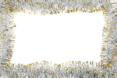 Photo of Frame of shiny tinsel on white background, top view. Space for text