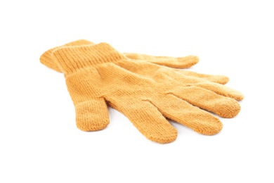 Photo of Yellow woolen gloves on white background. Winter clothes