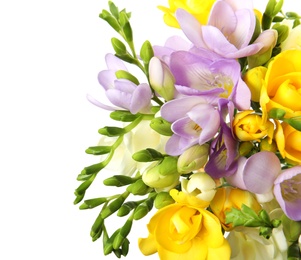 Photo of Bouquet of fresh freesia flowers isolated on white, top view