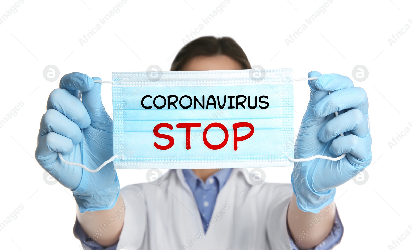 Image of Doctor holding medical mask with text Coronavirus Stop on white background. Protective measures during pandemic