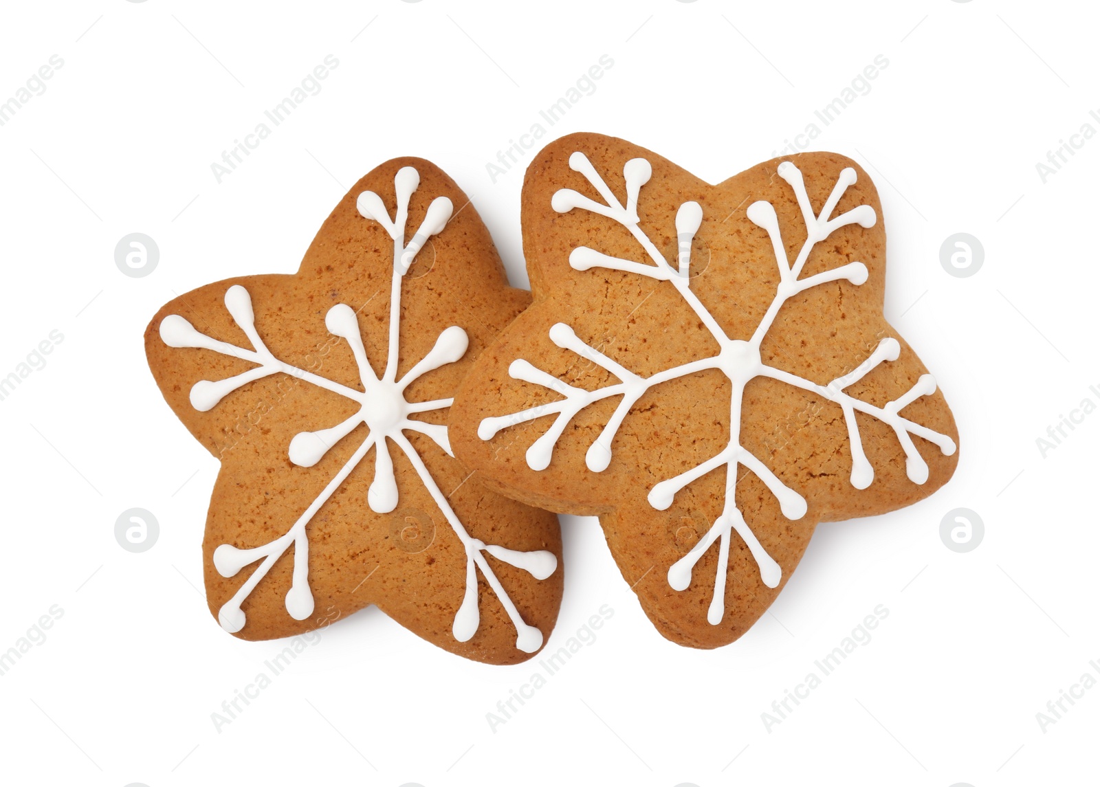 Photo of Tasty star shaped Christmas cookies with icing isolated on white, top view