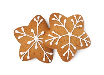 Photo of Tasty star shaped Christmas cookies with icing isolated on white, top view