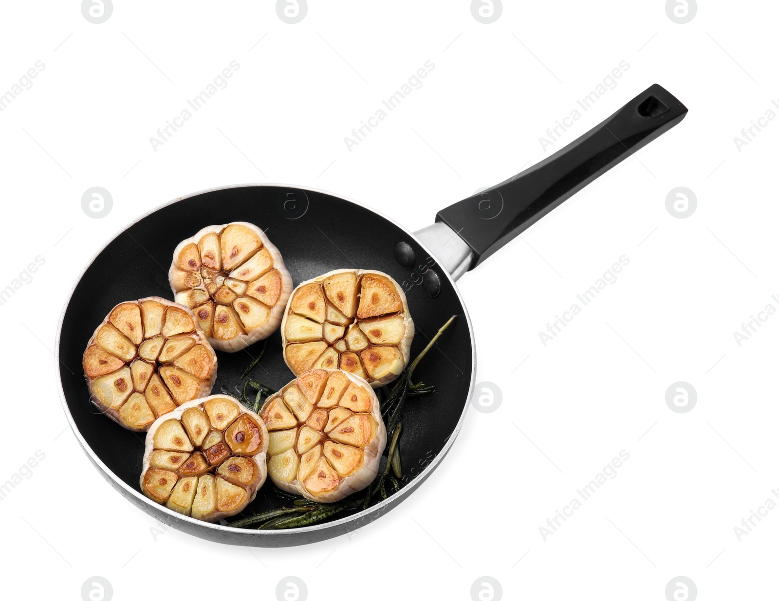 Photo of Frying pan with fried garlic isolated on white