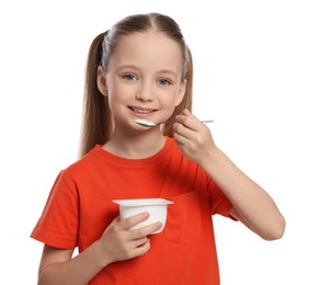 Photo of Cute little girl with tasty yogurt on white background