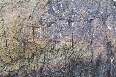 Photo of Textured of old stone surface as background, closeup