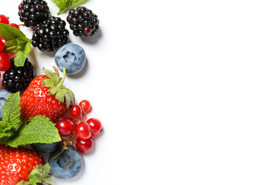 Photo of Mix of fresh berries on white background, flat lay