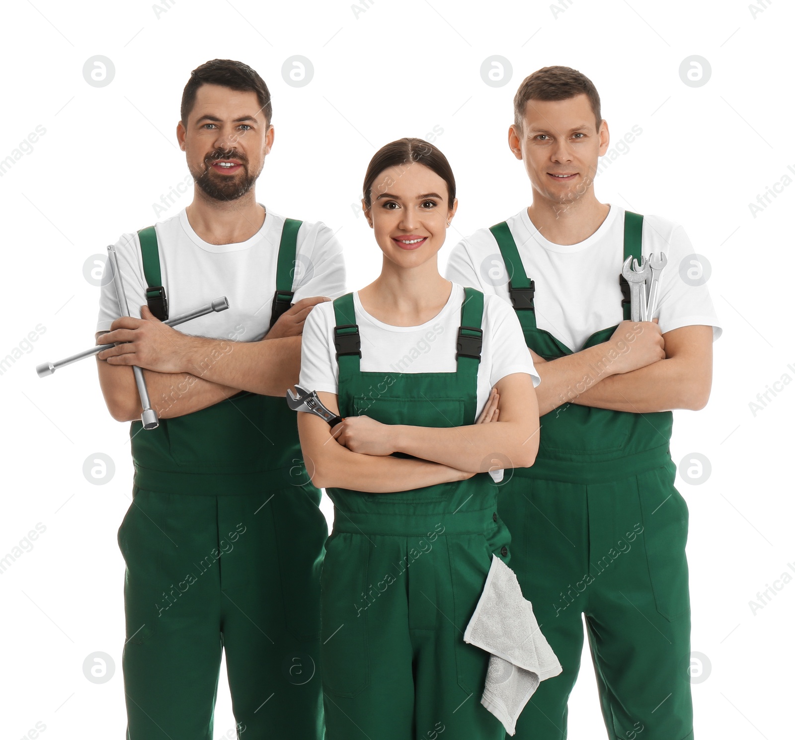 Photo of Portrait of professional auto mechanics on white background