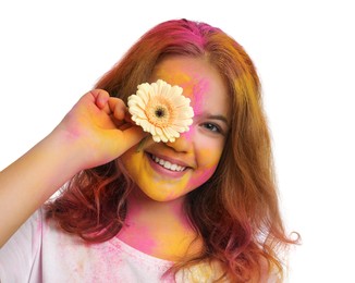 Photo of Teen girl covered with colorful powder dyes holding flower on white background. Holi festival celebration