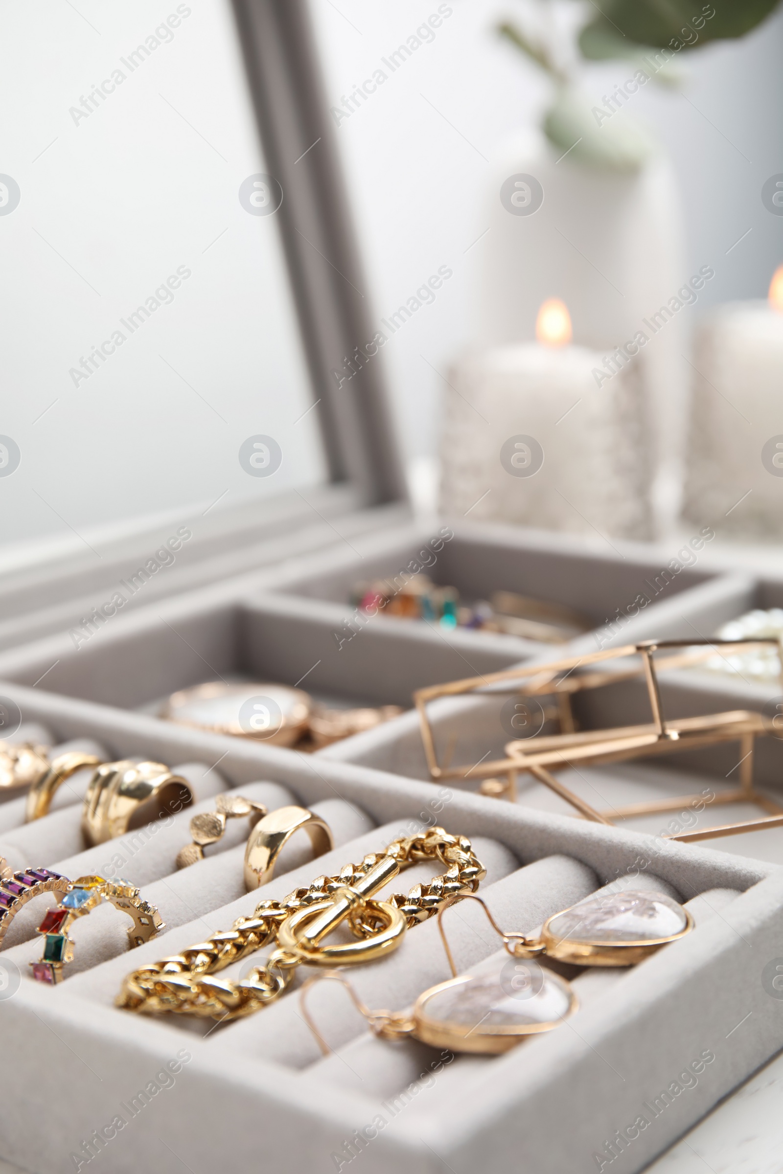 Photo of Elegant jewelry box with beautiful bijouterie, closeup