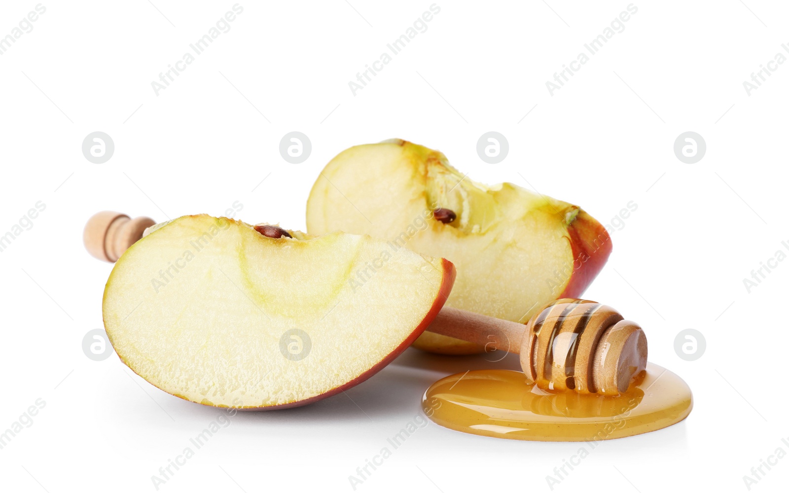 Photo of Apple, honey and dipper on white background