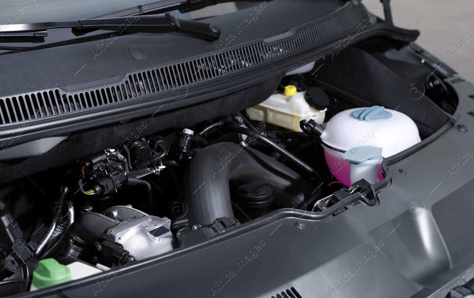 Photo of Closeup view of engine bay in modern car