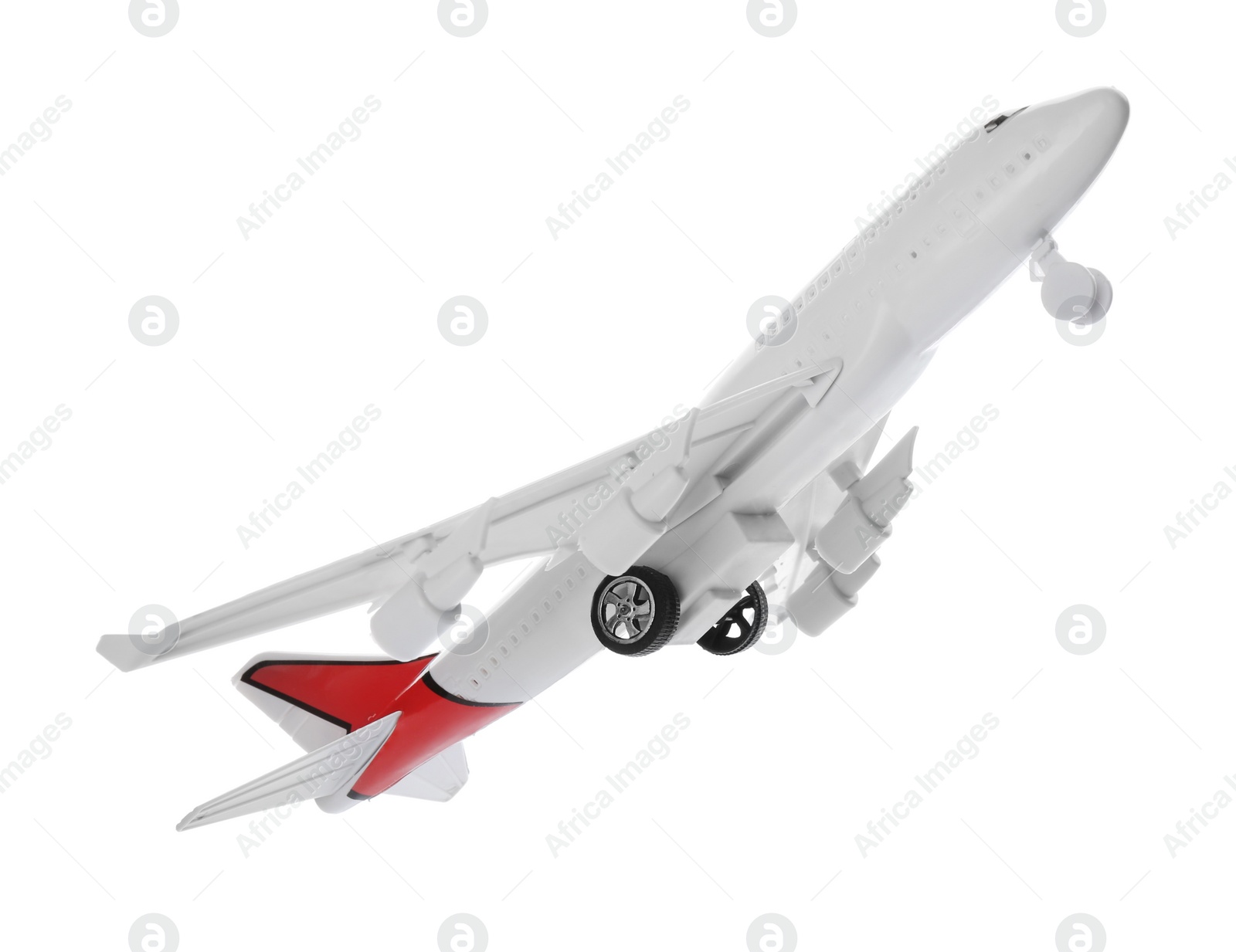 Photo of Toy airplane isolated on white. Travel concept