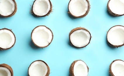 Photo of Coconut pattern on color background, flat lay