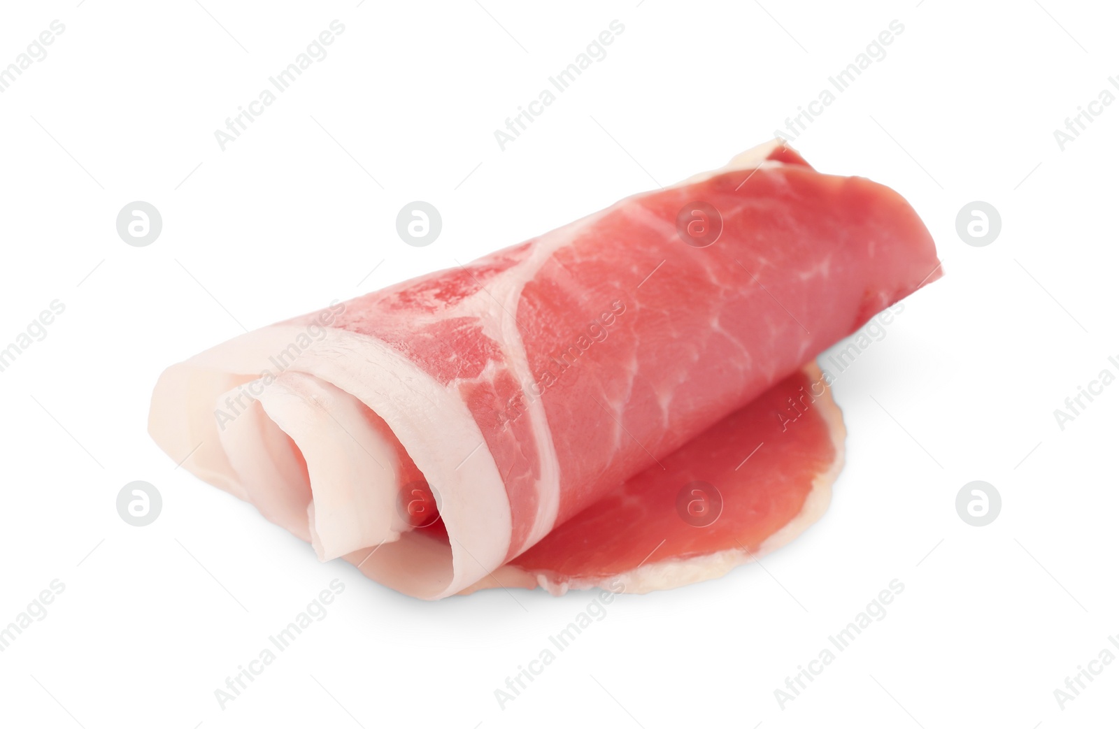 Photo of Rolled slice of tasty jamon isolated on white