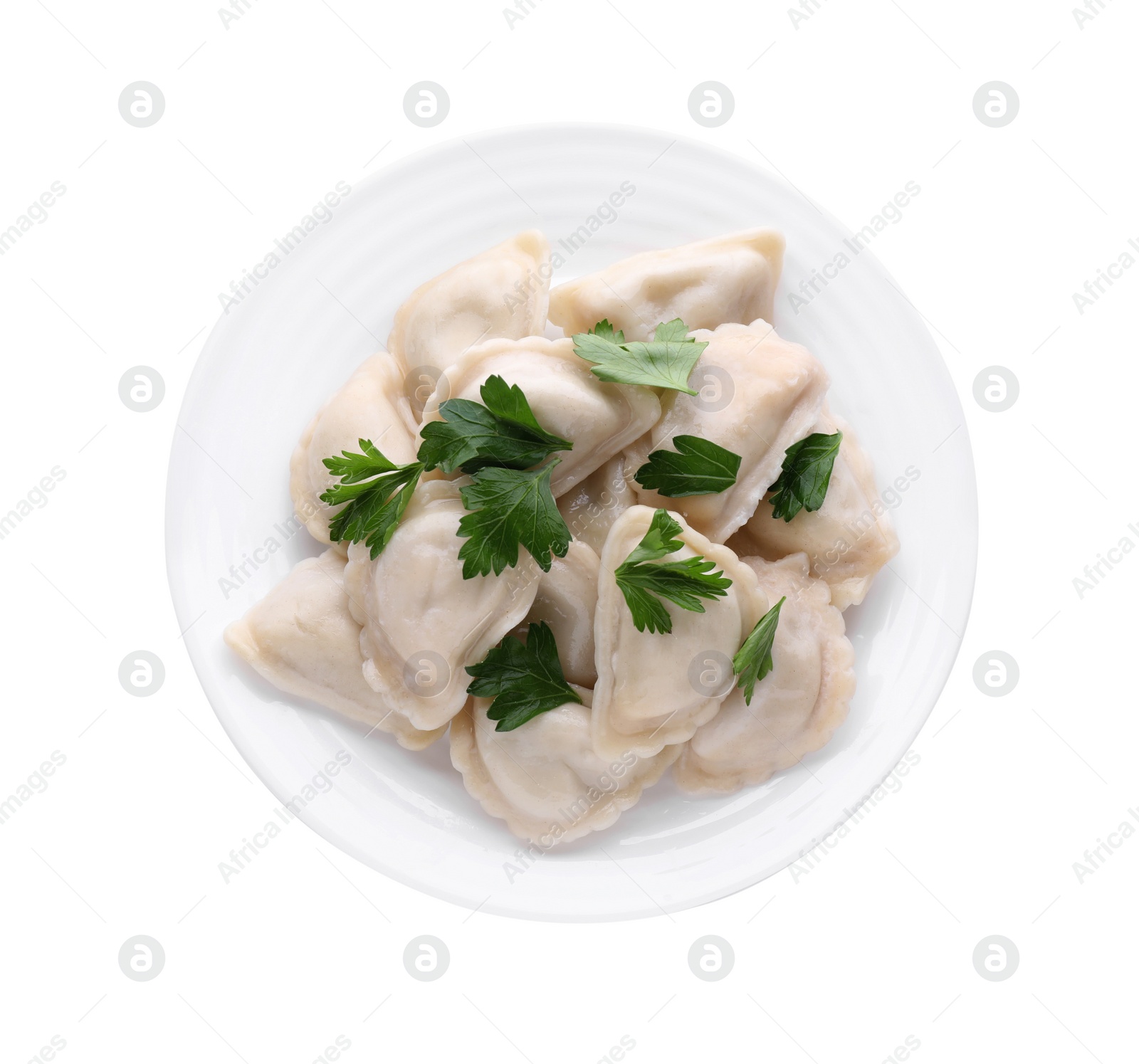 Photo of Delicious dumplings (varenyky) with tasty filling and parsley on white background, top view