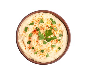 Photo of Tasty hummus with parsley and paprika in bowl isolated on white, top view