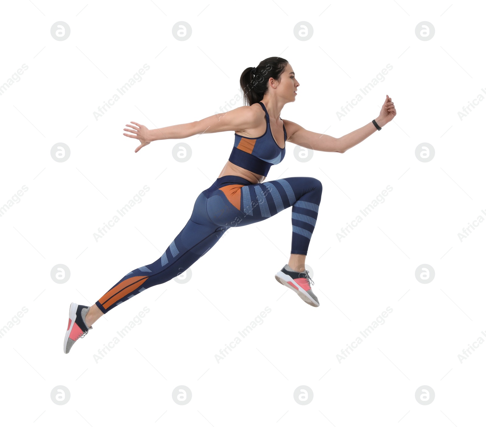 Photo of Athletic young woman running on white background, side view