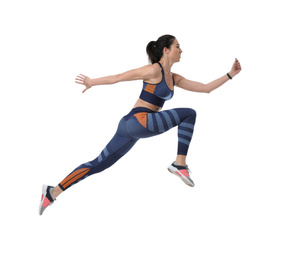 Athletic young woman running on white background, side view