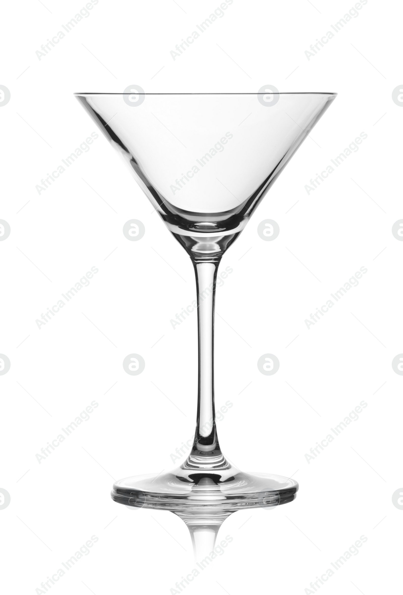 Photo of Empty crystal martini glass on white background