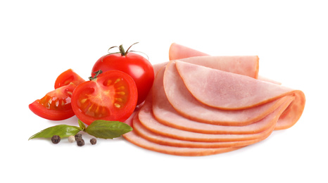 Slices of tasty fresh ham with basil, tomatoes and pepper isolated on white