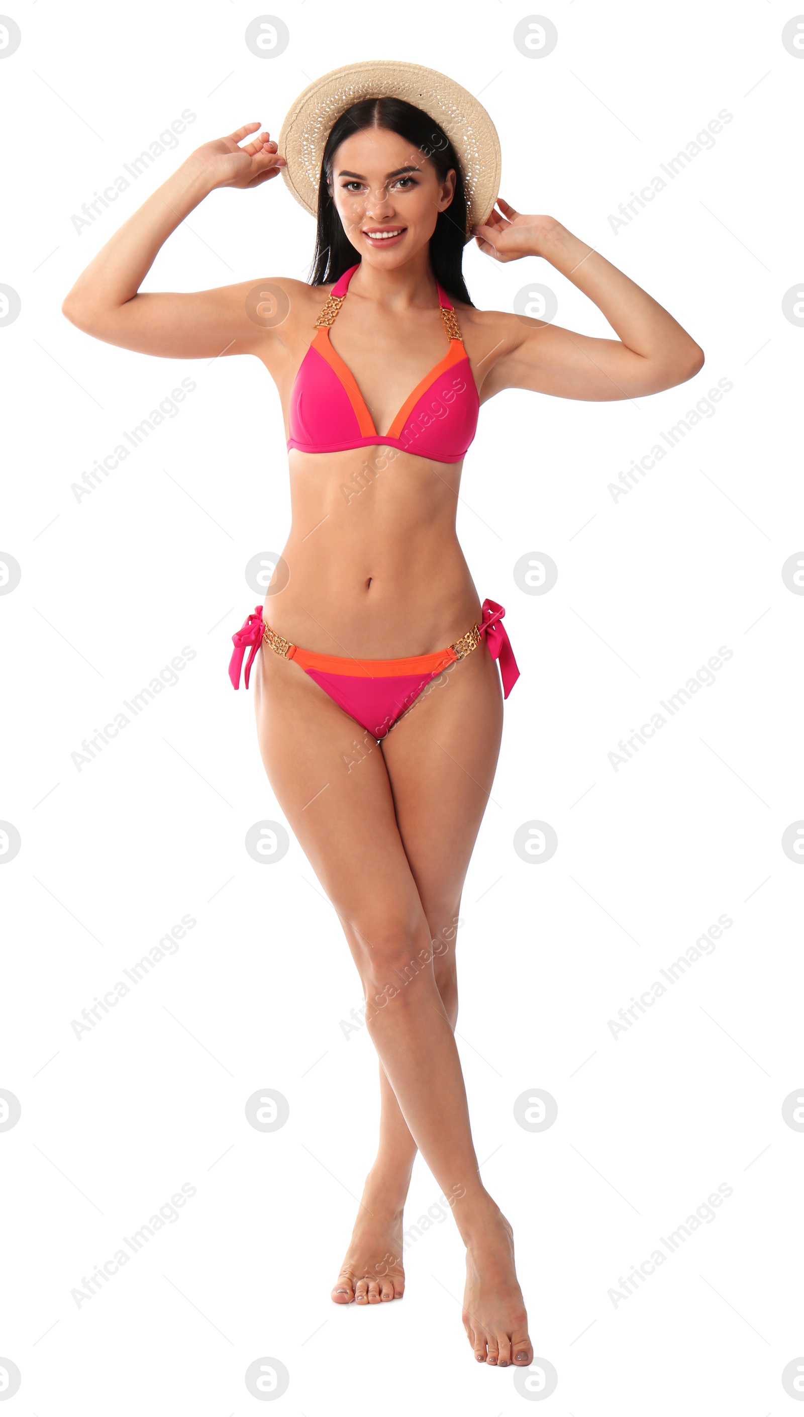 Photo of Beautiful young woman in stylish bikini with hat on white background